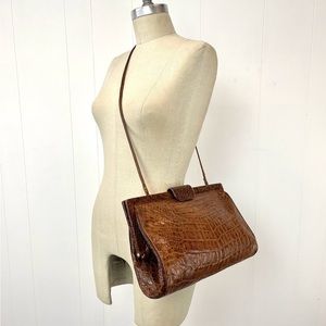 BLACK Paola del Lungo leather purse.